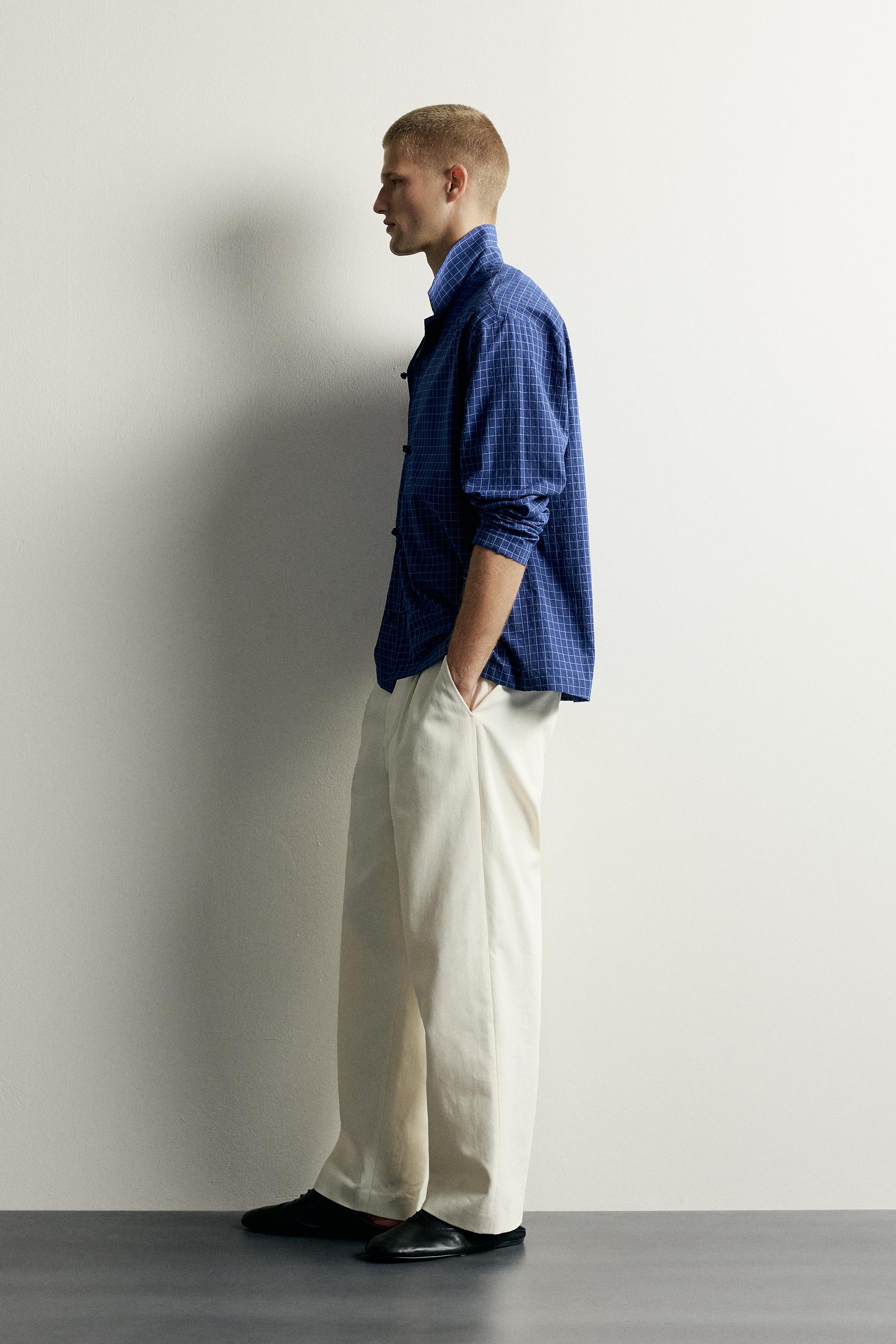 CHEMISE À CARREAUX ET FERMETURE BRANDEBOURGS